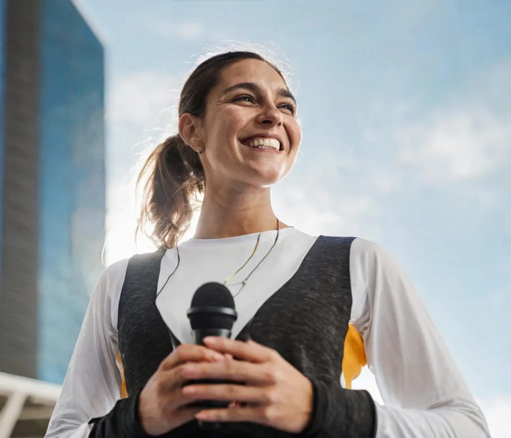 Smiling woman holding Microphone